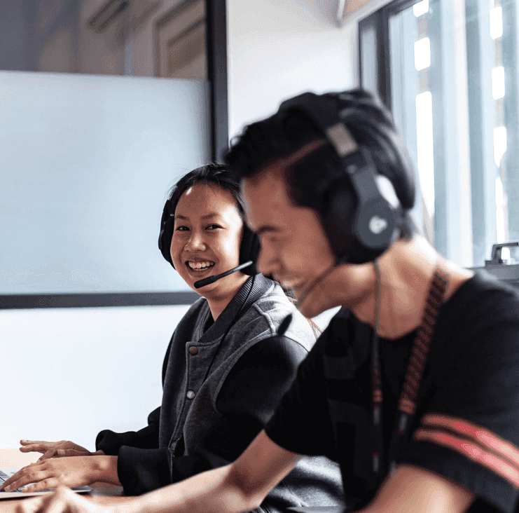 Customer support team smiling